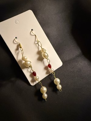 String of Pearls with Ruby Pearls Twisted